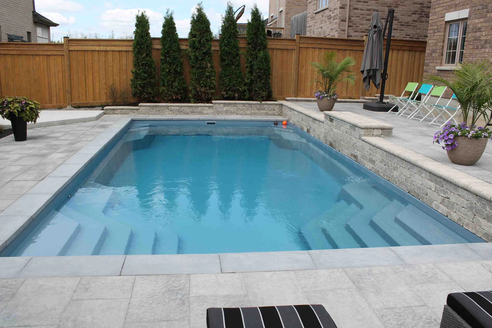 Crystal-clear residential swimming pool